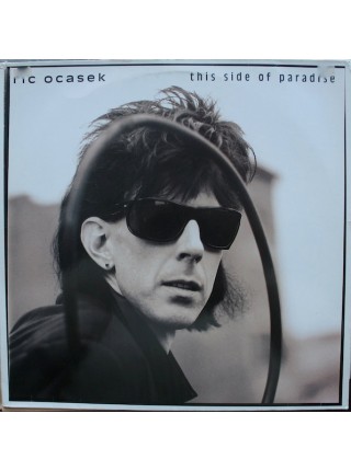 1402609		Ric Ocasek – This Side Of Paradise	Electronic, New Wave, Synth-pop, Pop Rock	1986	Geffen Records – 924 098-1	NM/NM	Europe	Remastered	1986