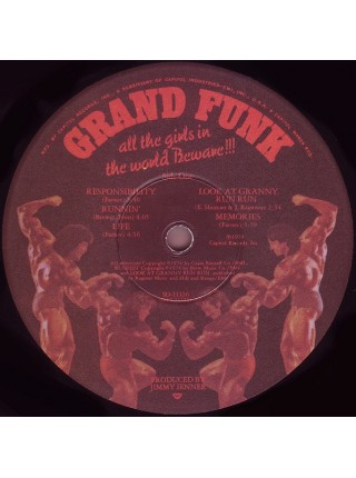 1403455	Grand Funk – All The Girls In The World Beware !!!	Classic Rock	1974	Capitol Records – SO-11356	EX+/EX+	USA