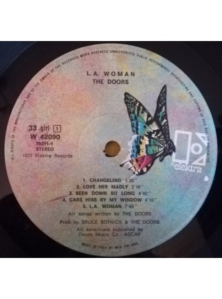 1403757		The Doors ‎– L.A. Woman	Blues Rock, Psychedelic Rock 	1971	Elektra – W 42090	EX+/EX+	Italy	Remastered	1977